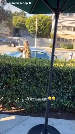  Tiwa Savage caught being cute and taking