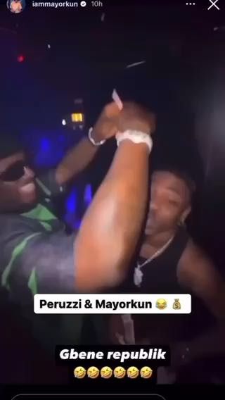  Perruzi making it rain on Mayorkun
cc: