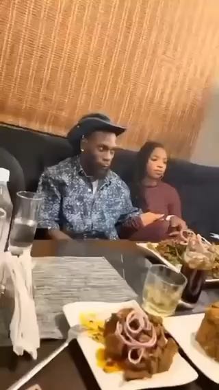  Burna Boy having dinner with his woman