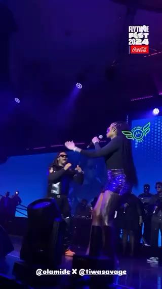  Olamide and Tiwa Savage performing
