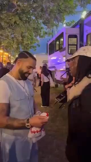  Drake and Rema catching up at the